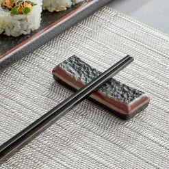 Acopa Heika Black Matte Textured Stoneware Chopstick Rest
